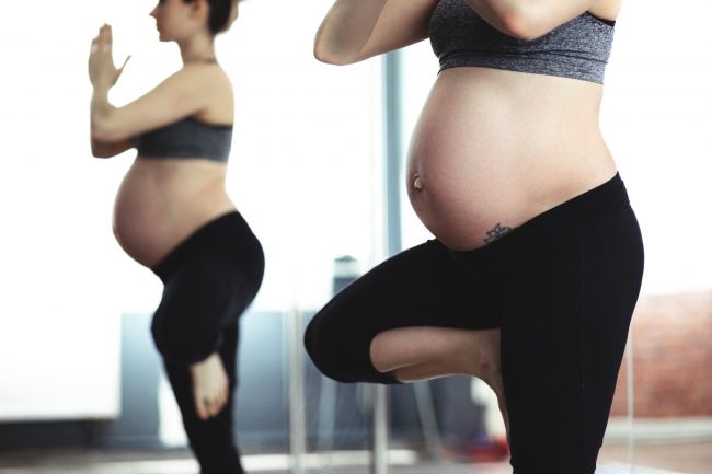 Vulvar Varicosities: How to Manage Varicose Veins of the Vulva. Pregnant lady doing yoga