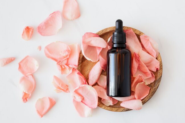 essential oil with flower petals