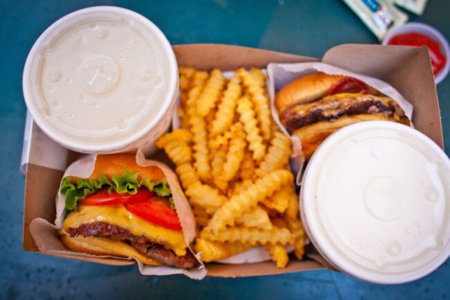 fast food meal - burgers, fries and milkshake